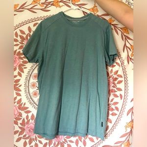 A men’s blue, size large, Kenneth Cole shirt. Worn only once.